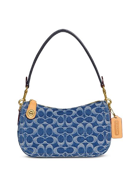 coach original swinger shoulder bag|coach denim swinger bag.